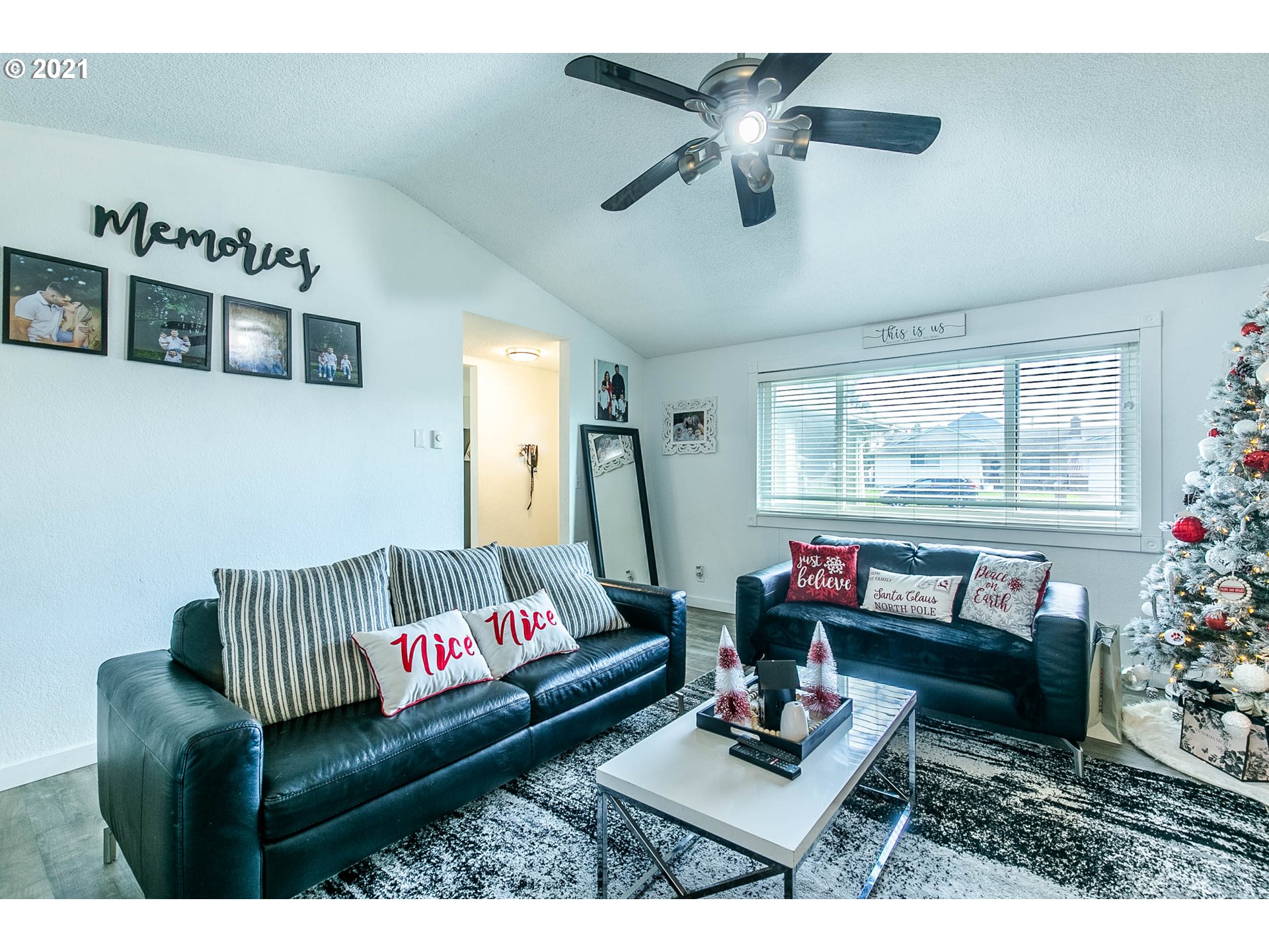 168 North 38th Place Springfield, OR 97478 - Photo 4 of 19 a living room with furniture rug and window