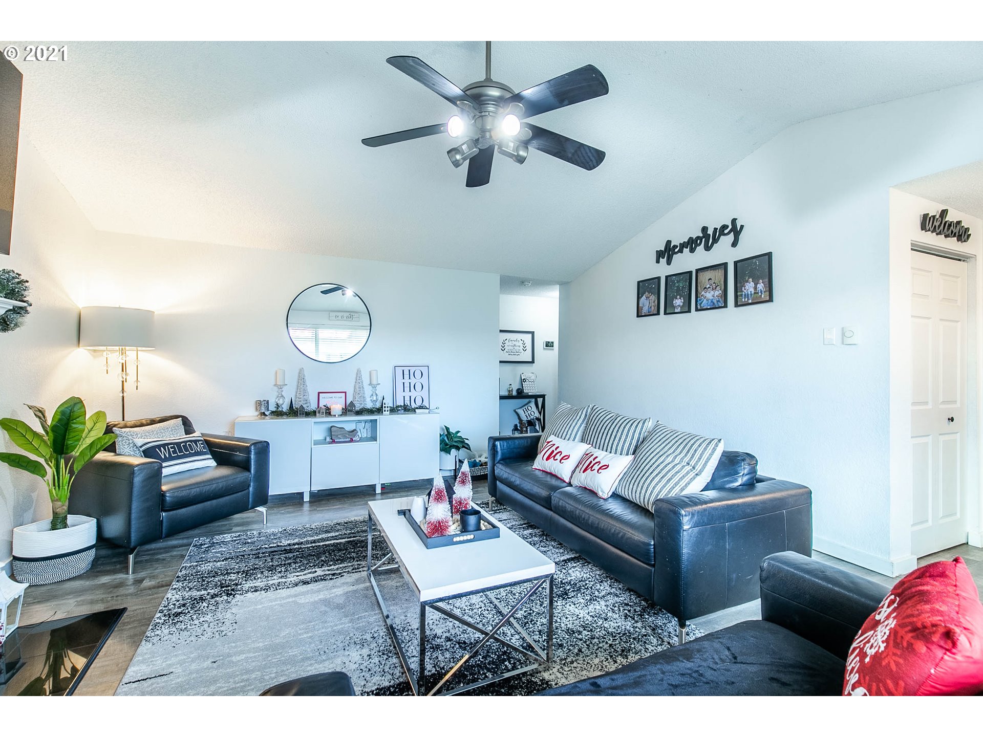 168 North 38th Place Springfield, OR 97478 - Photo 5 of 19 a living room with furniture and a chandelier