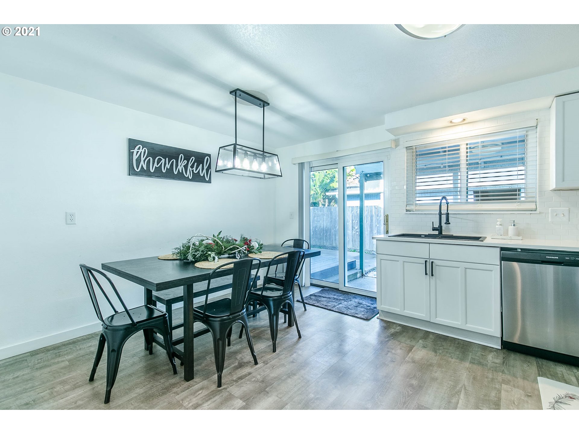 168 North 38th Place Springfield, OR 97478 - Photo 7 of 19 a view of a dining room with furniture and window