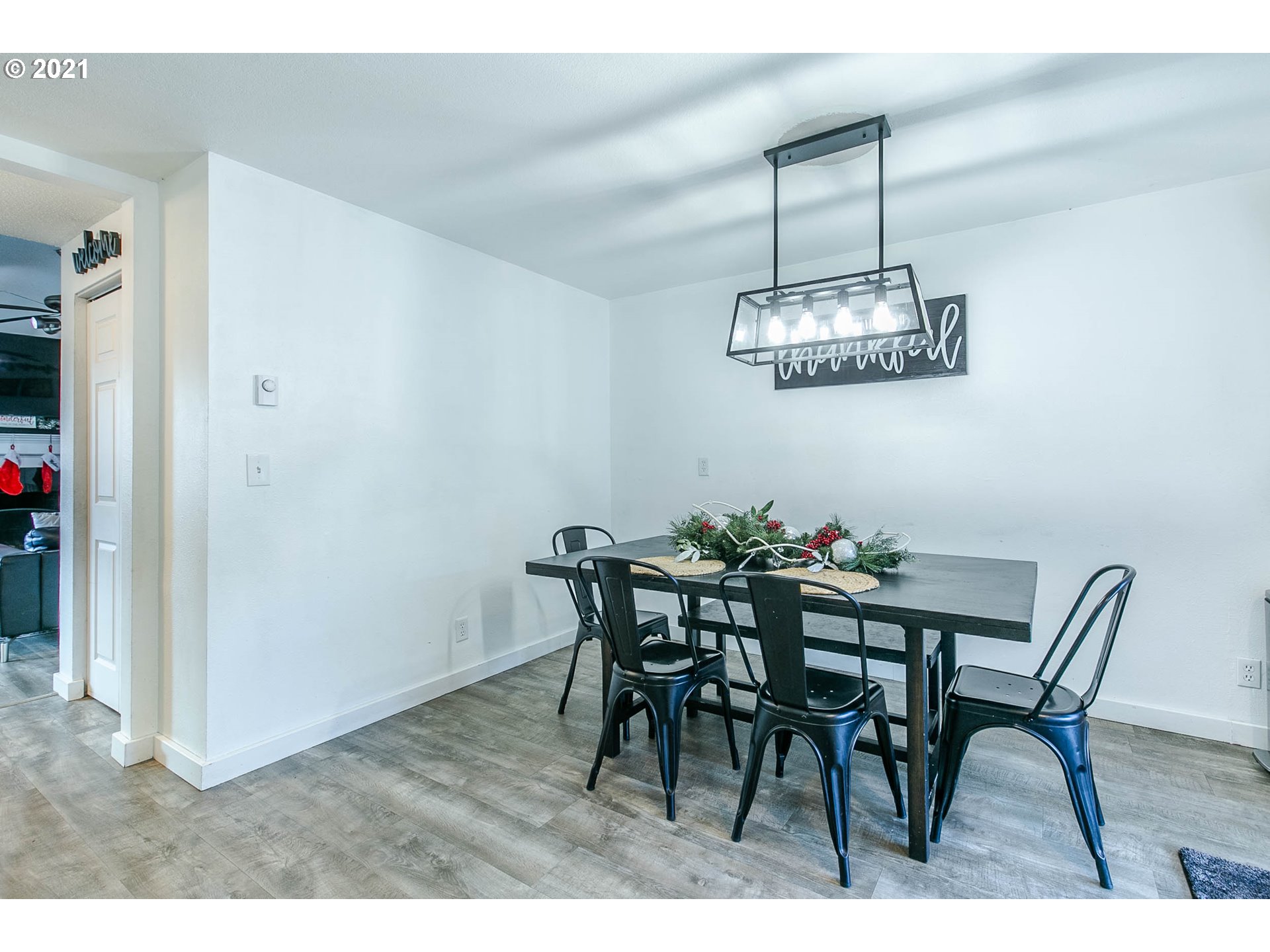 168 North 38th Place Springfield, OR 97478 - Photo 8 of 19 a view of a dining room with furniture and chandelier