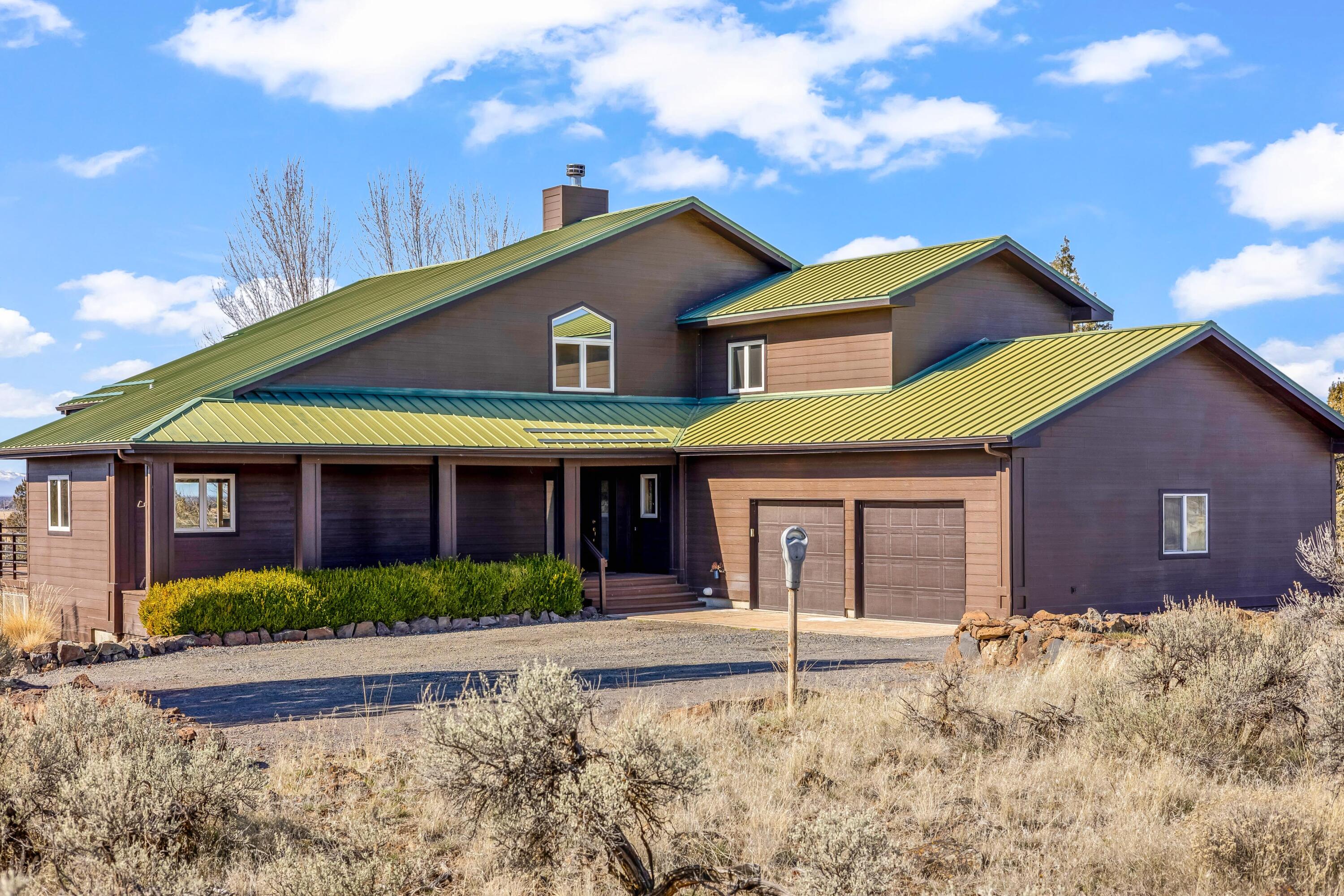 1164 Southwest Parrish Lane Powell Butte, OR 97753 - Photo 2 of 54 back of house