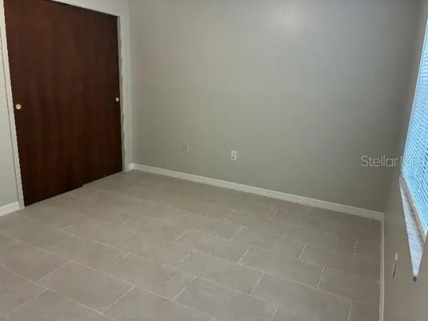 an empty room with a window