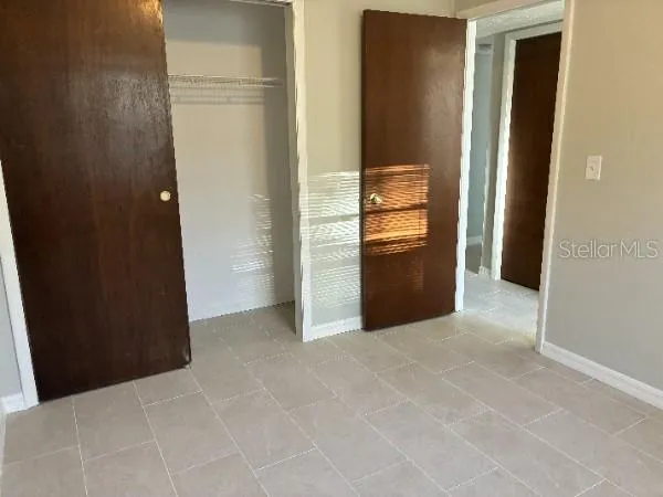 a view of a kitchen with an empty space