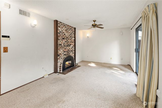 a view of a kitchen with a sink and a kitchen view