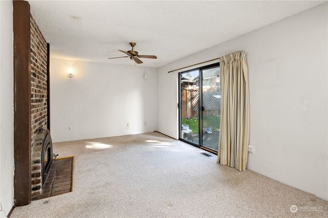 a kitchen with stainless steel appliances a refrigerator and a sink