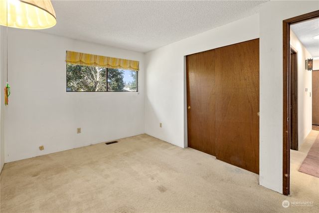 a view of lake with a city