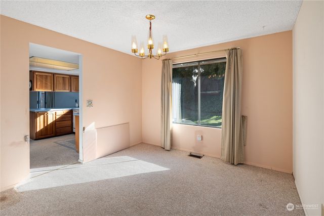 a view of a room with a large window