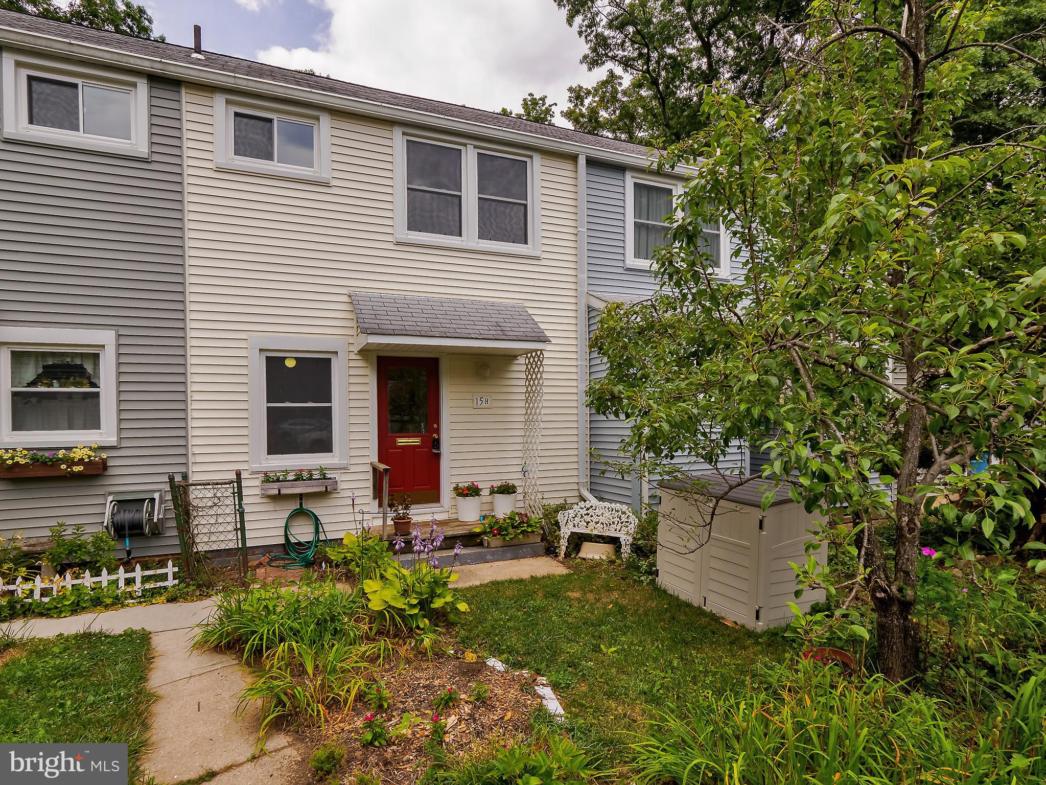 a house view with a garden space