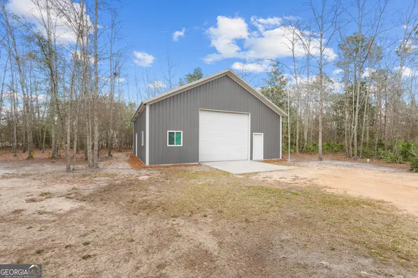 a view of backyard of house