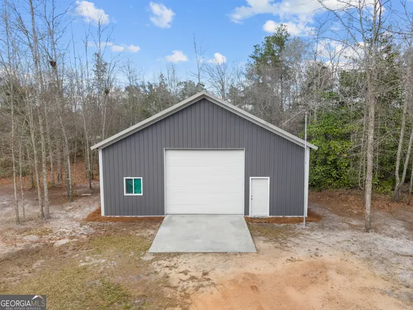view of a wooden floor with a wall