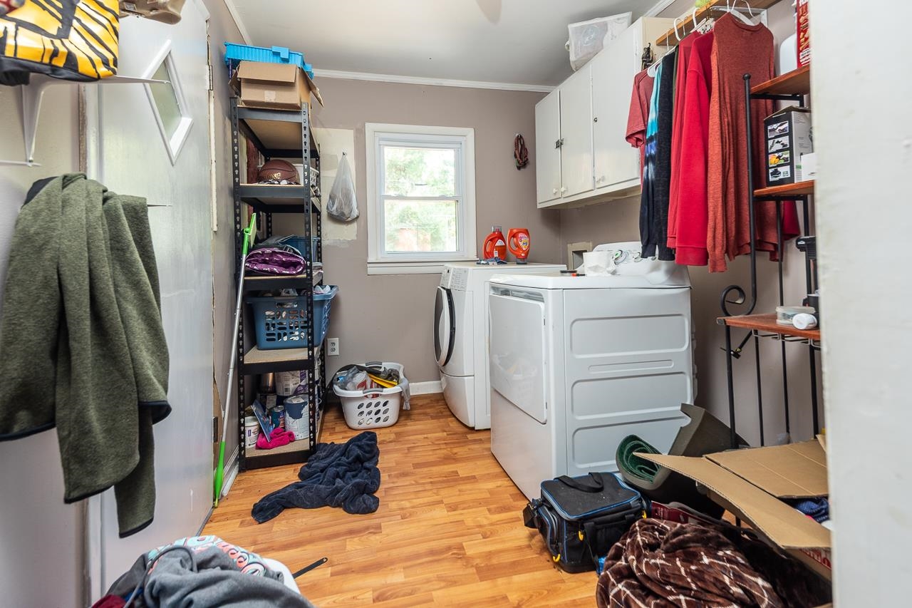 5080 Sea Isle Road Memphis, TN 38117 - Photo 12 of 21 a view of walk in closet with clothes and shoes