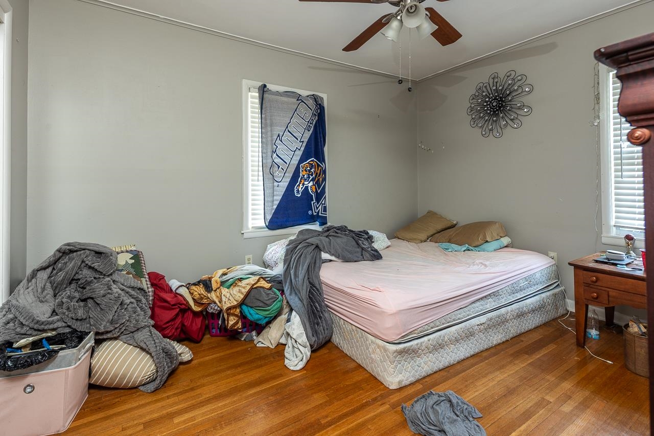 5080 Sea Isle Road Memphis, TN 38117 - Photo 13 of 21 a bedroom with bed and a window