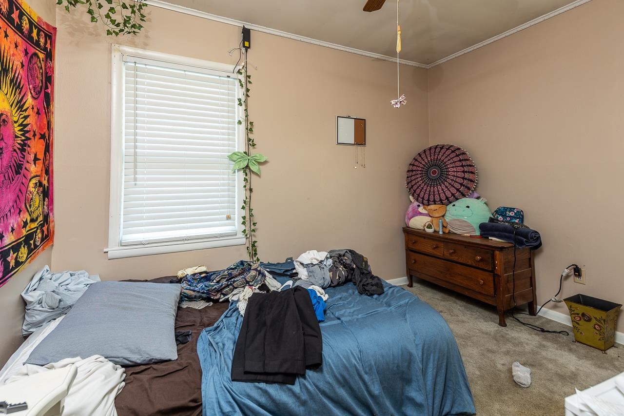 5080 Sea Isle Road Memphis, TN 38117 - Photo 21 of 21 a bed room with a bed and a window