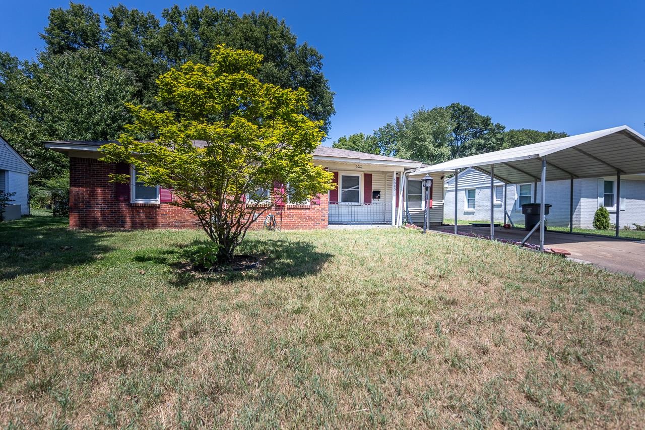 5080 Sea Isle Road Memphis, TN 38117 - Photo 3 of 21 front view of a house with a yard