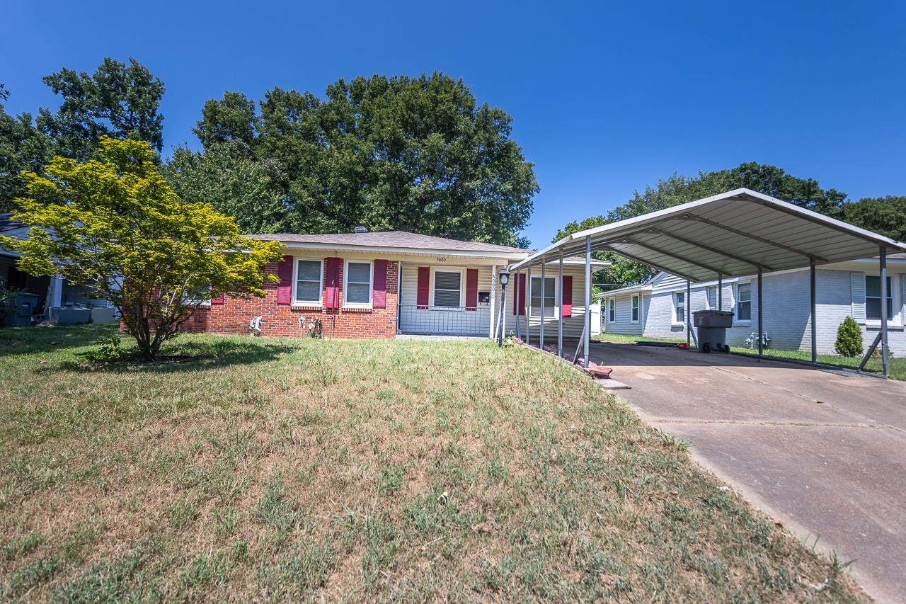 5080 Sea Isle Road Memphis, TN 38117 - Photo 4 of 21 a view of a house with a yard
