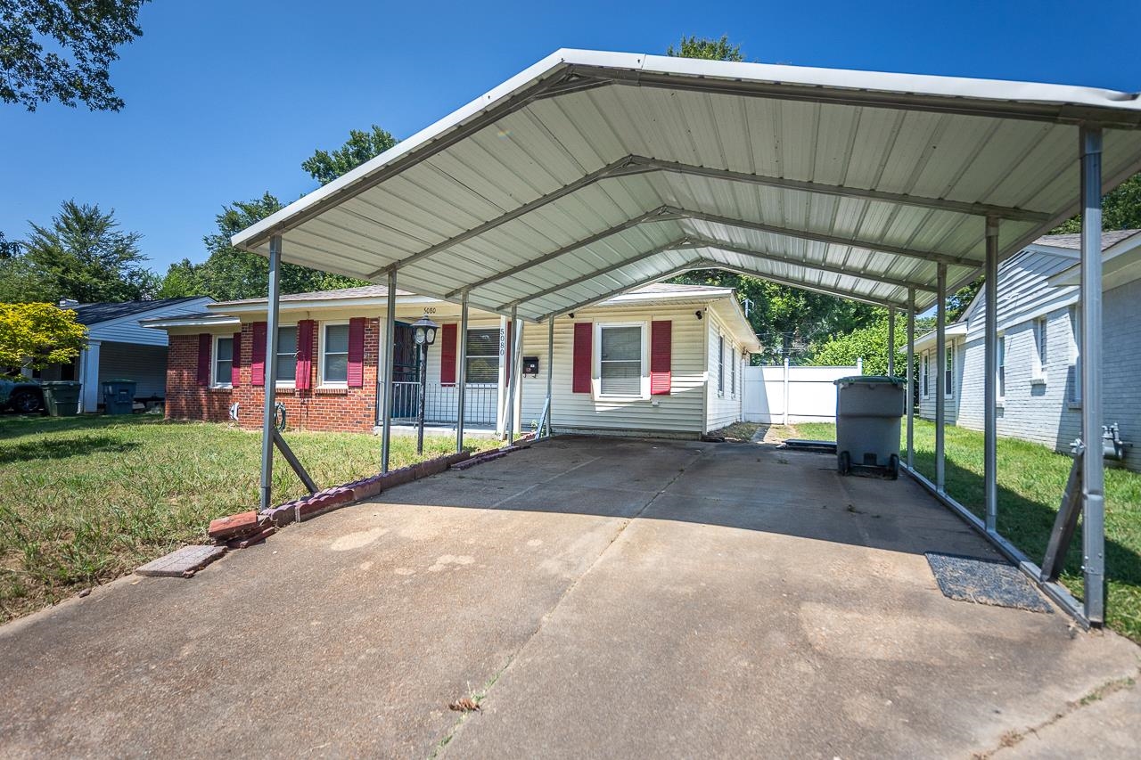 5080 Sea Isle Road Memphis, TN 38117 - Photo 5 of 21 a view of a house with backyard and porch