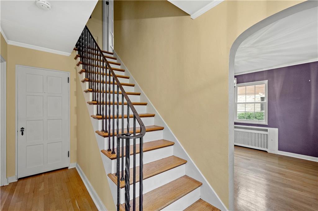 4520 Norwin Road Pittsburgh, PA 15236 - Photo 15 of 31 a view of entryway with wooden floor and stairs
