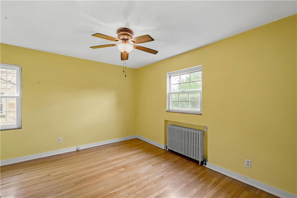 4520 Norwin Road Pittsburgh, PA 15236 - Photo 20 of 31 a view of empty room with wooden floor and fan