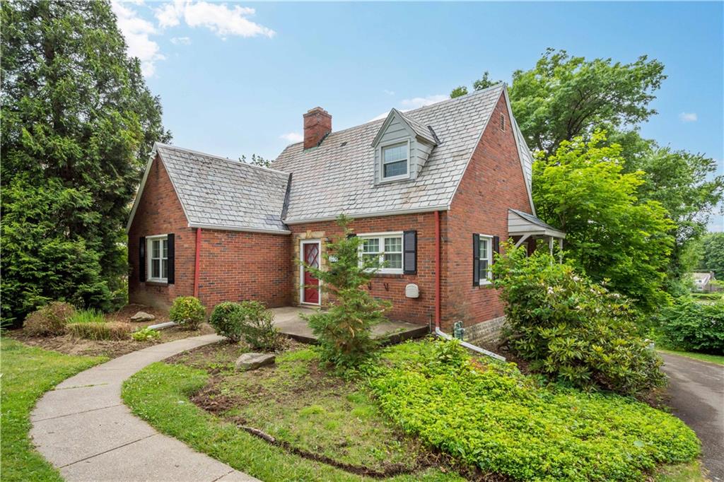 4520 Norwin Road Pittsburgh, PA 15236 - Photo 2 of 31 a front view of a house with garden