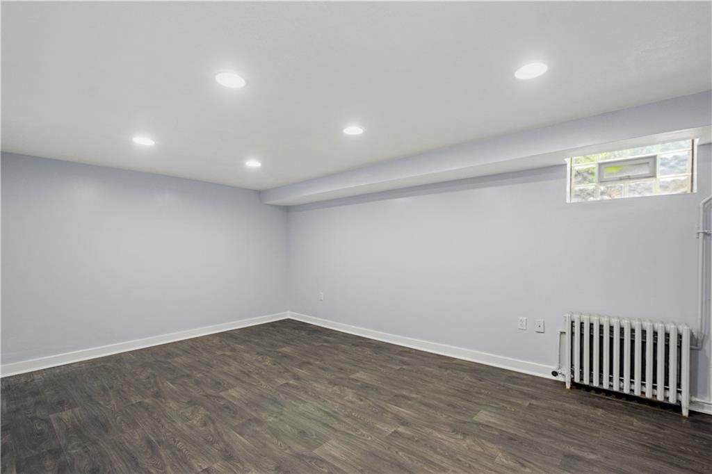 4520 Norwin Road Pittsburgh, PA 15236 - Photo 22 of 31 an empty room with wooden floor