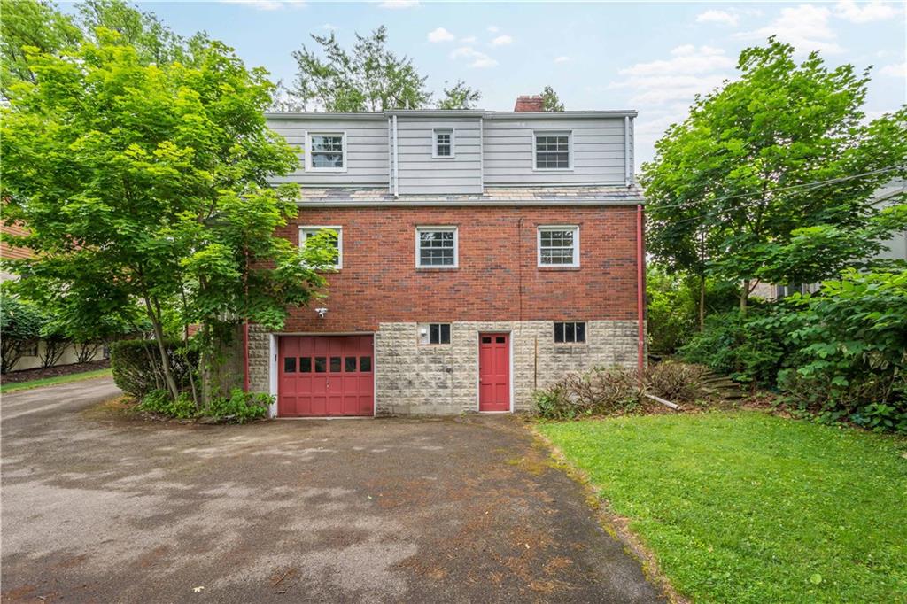 4520 Norwin Road Pittsburgh, PA 15236 - Photo 24 of 31 front view of a house with a street