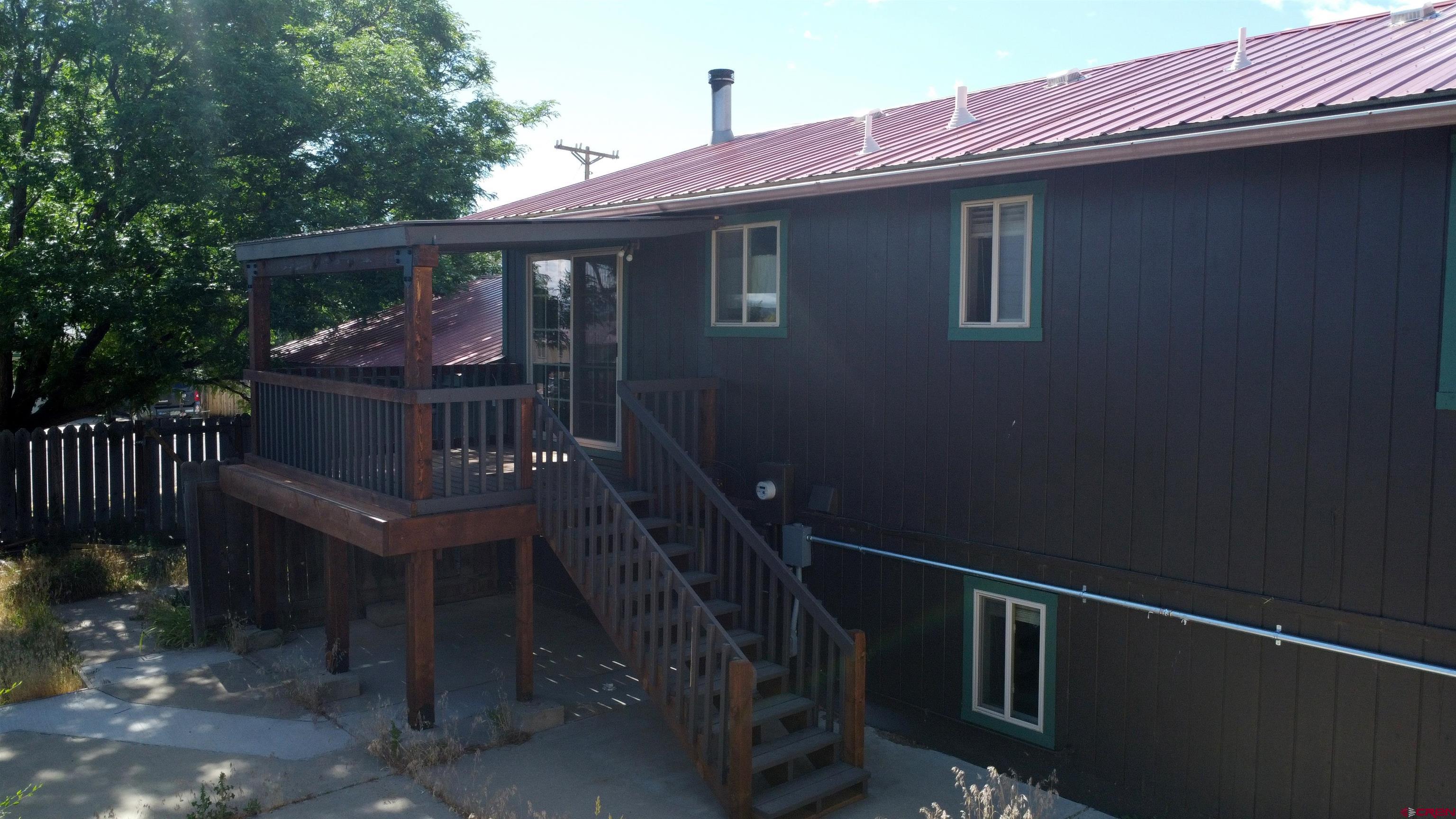1328 Jackson Street Cortez, CO 81321 - Photo 13 of 37 a view of deck with patio