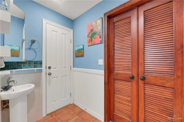 a bathroom with a sink and a shower