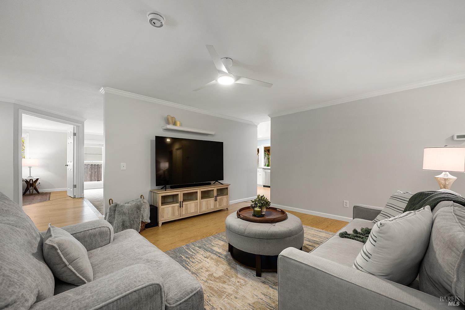 5313 Yerba Buena Road Santa Rosa, CA 95409 - Photo 33 of 34 A second view of the living room highlights its flexible layout and central location within the home's thoughtful floor plan.