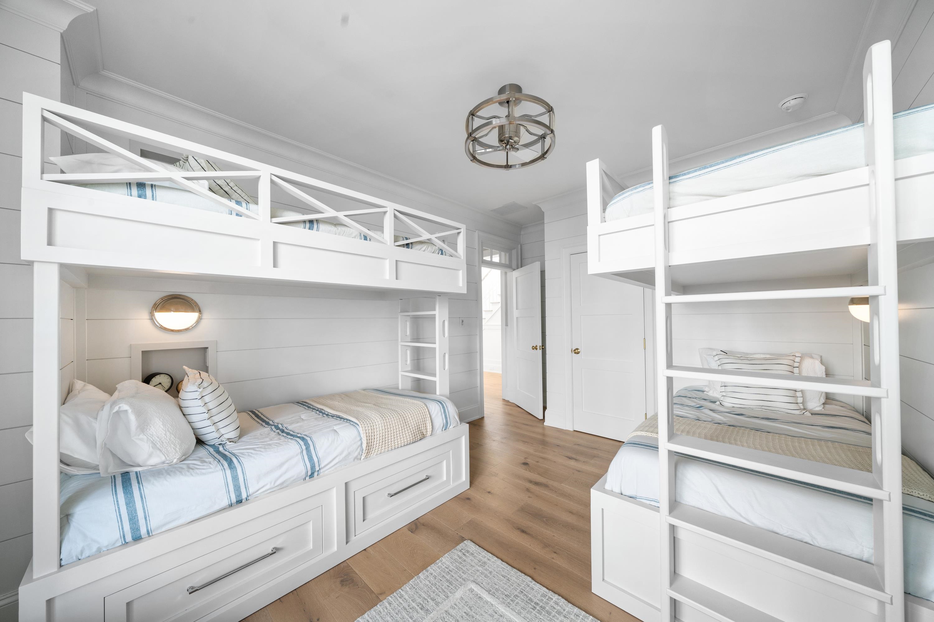 145 112th Stone Harbor, NJ 08247 - Photo 34 of 45 a bedroom with a bed and a large window