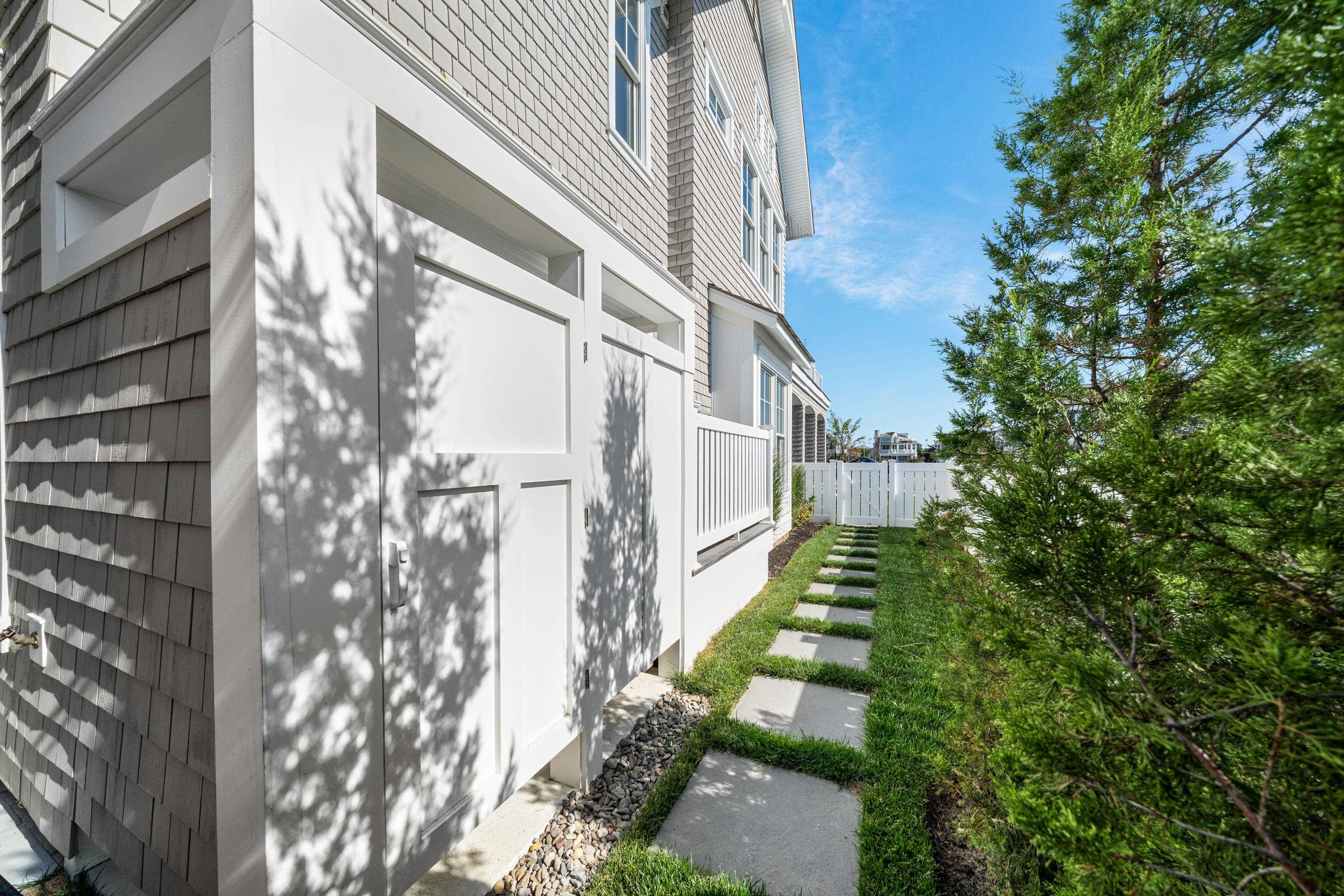 145 112th Stone Harbor, NJ 08247 - Photo 43 of 44 a view of a pathway of a building
