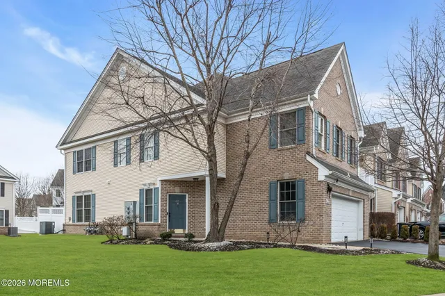 a view of a yard in front of a house