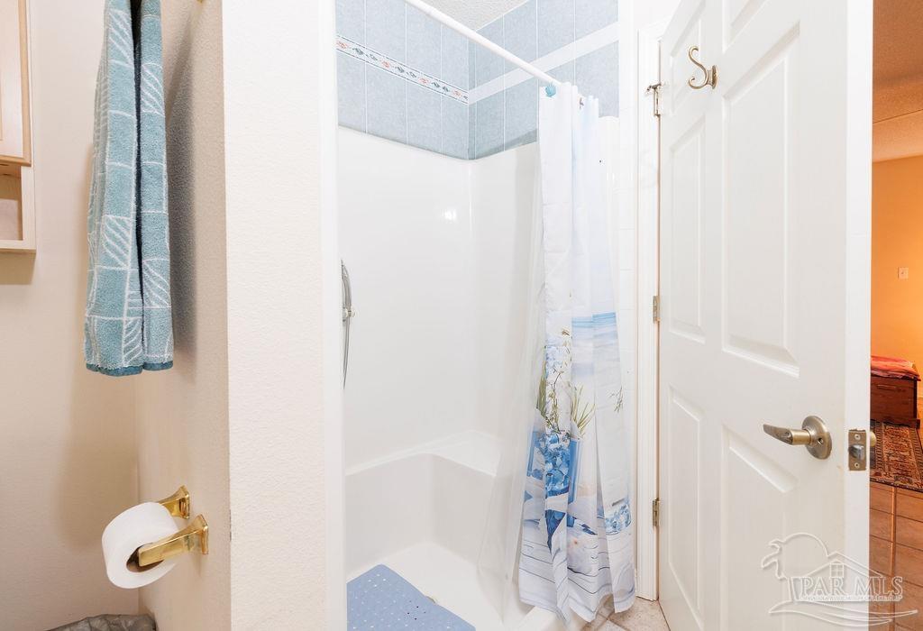 1590 Jacks Branch Road Cantonment, FL 32533 - Photo 14 of 19 a bathroom with a shower