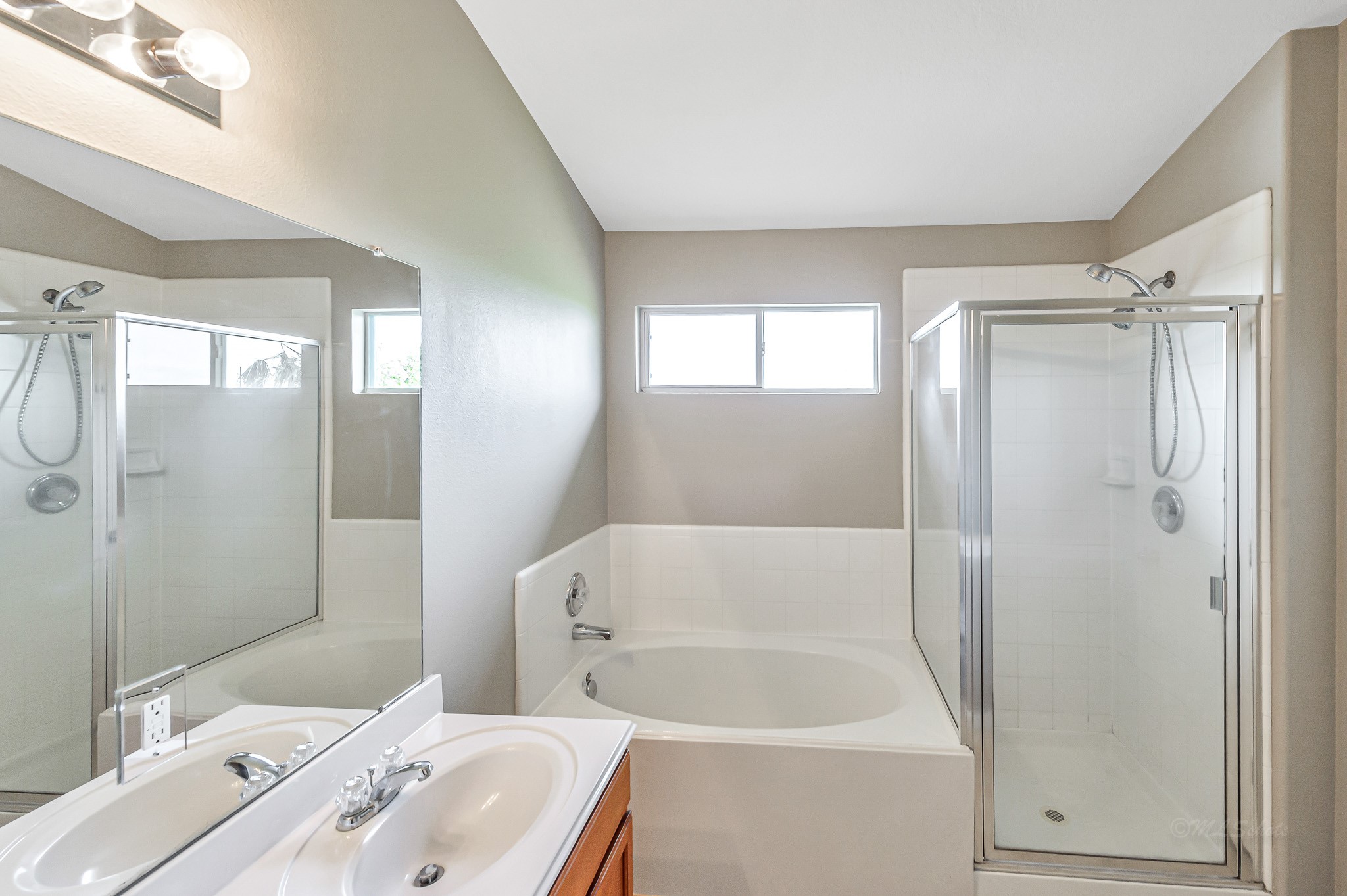 20243 Sunset Ranch Drive Katy, TX 77449 - Photo 25 of 36 a bathroom with a sink and a bathtub