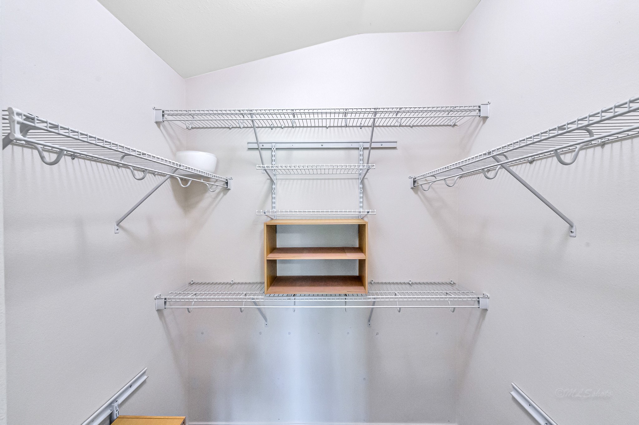 20243 Sunset Ranch Drive Katy, TX 77449 - Photo 27 of 36 a view of a room with racks on the wall