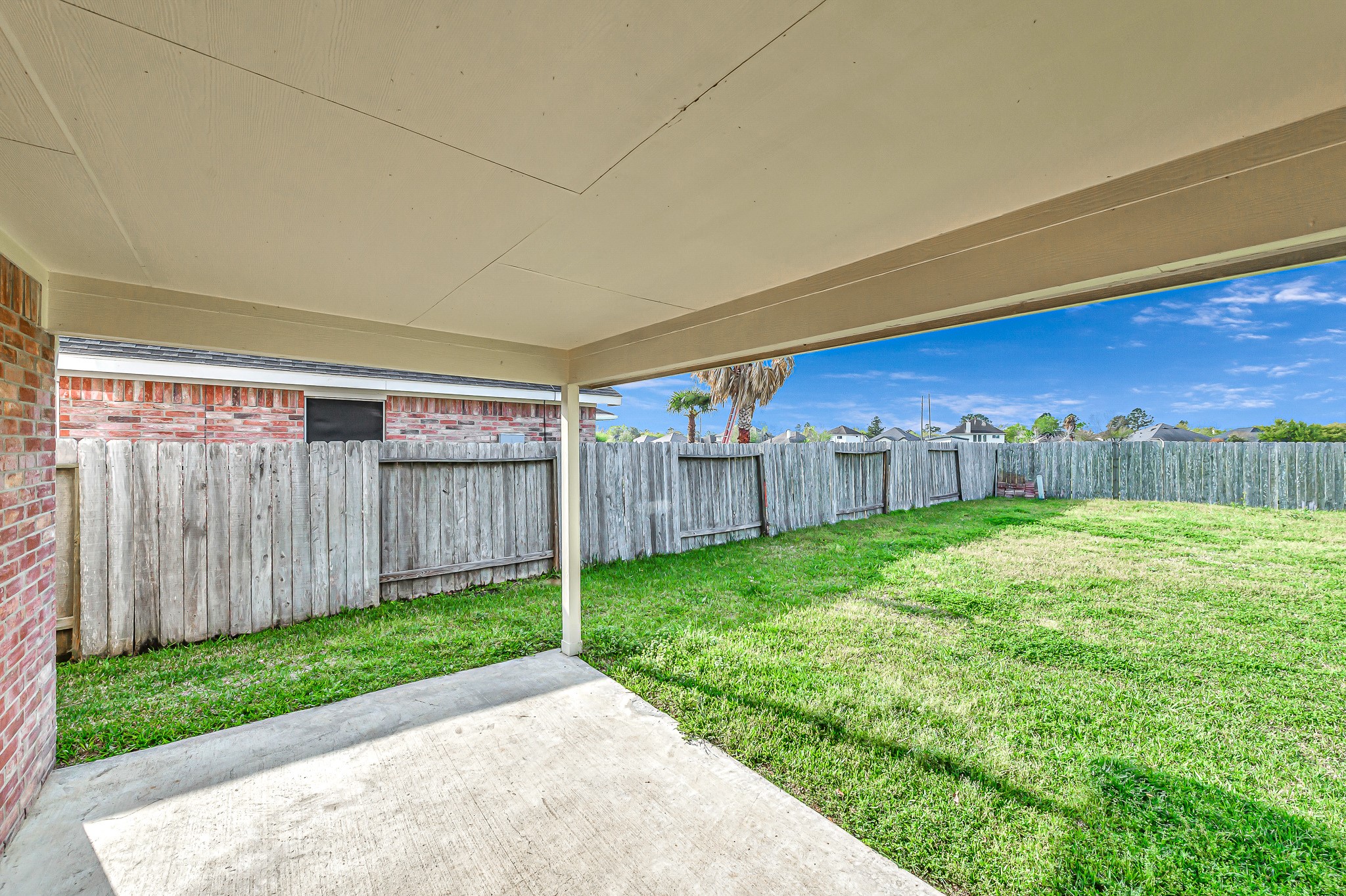 20243 Sunset Ranch Drive Katy, TX 77449 - Photo 35 of 36 a view of a backyard with wooden fence