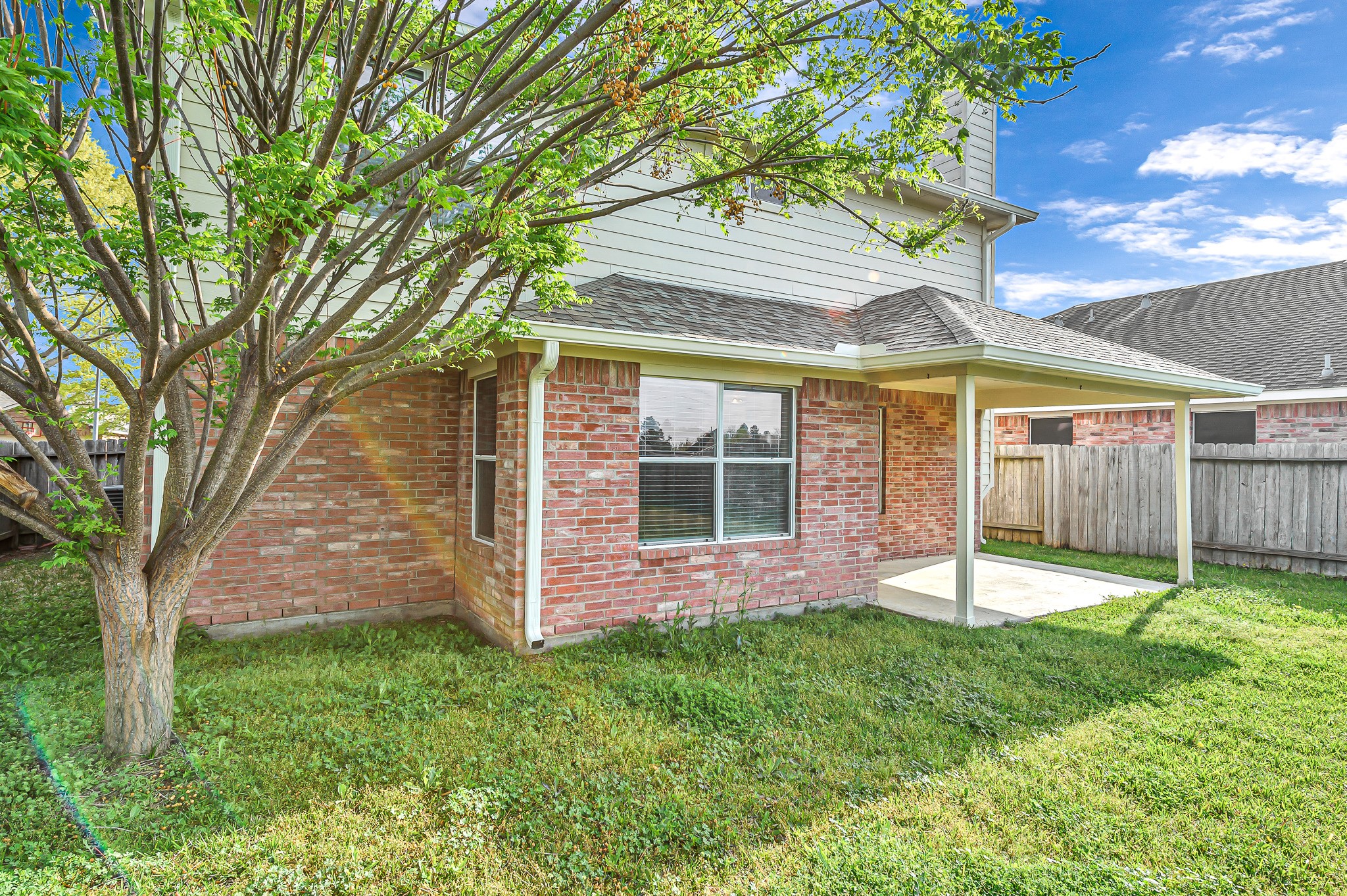 20243 Sunset Ranch Drive Katy, TX 77449 - Photo 36 of 36 front view of a house with a yard