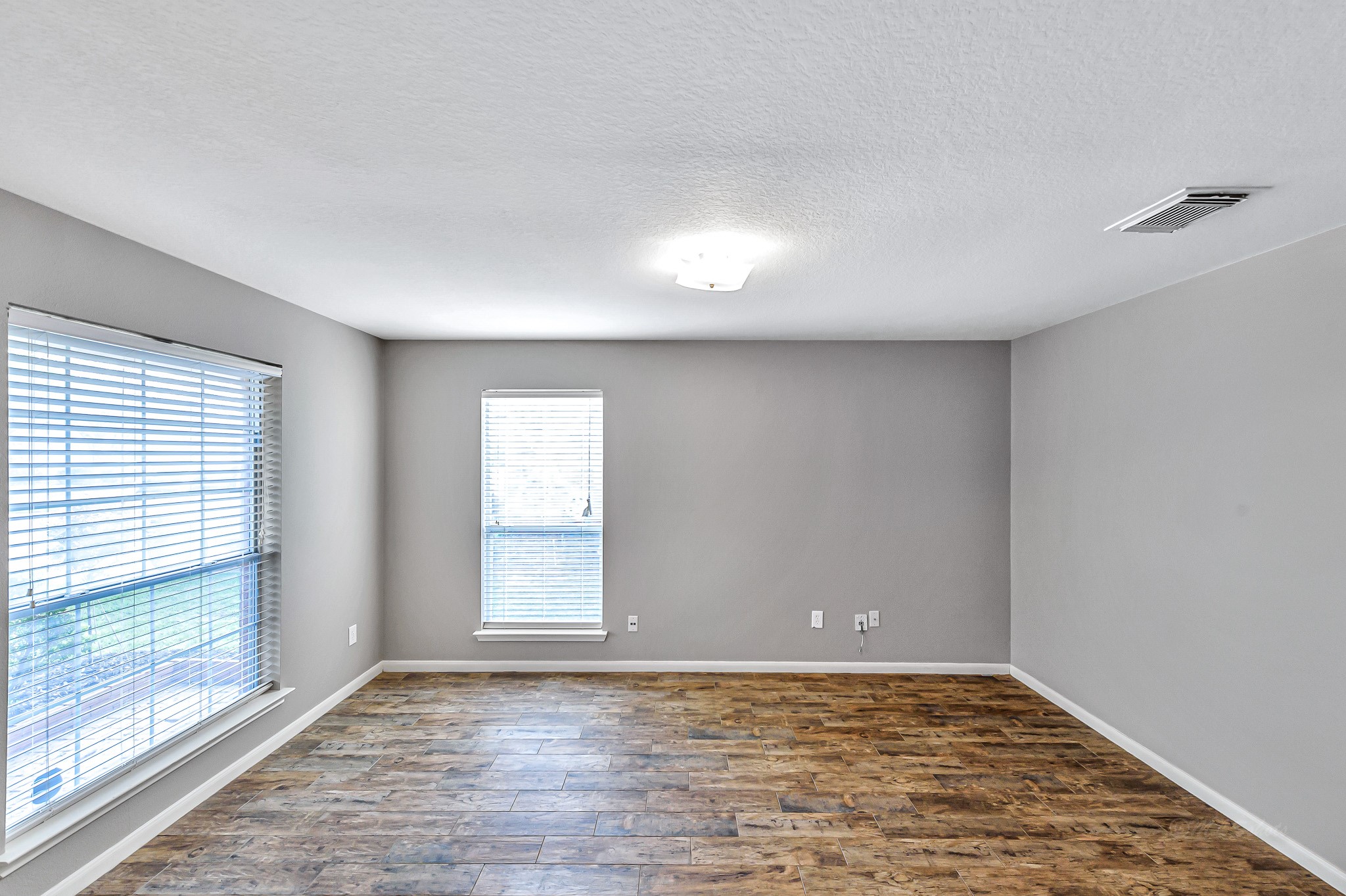 20243 Sunset Ranch Drive Katy, TX 77449 - Photo 5 of 36 a view of an empty room with a window
