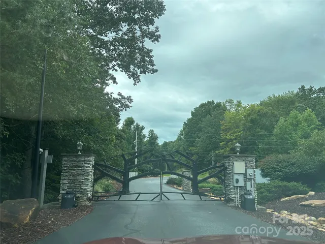 a view of a street with a building in the background