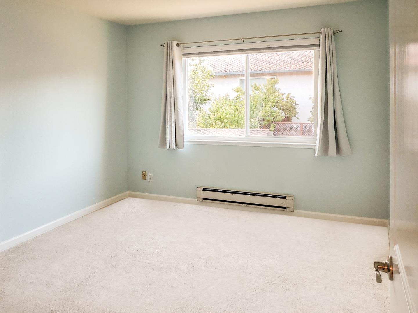 50 East Middlefield Road, Unit 4 Mountain View, CA 94043 - Photo 8 of 12 a view of a room with a large window