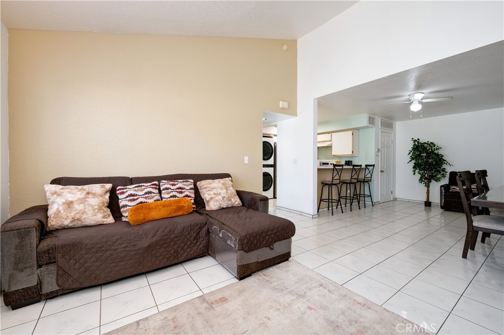 15000 Downey Avenue, Unit 343 Paramount, CA 90723 - Photo 11 of 39 a living room with furniture and a couch