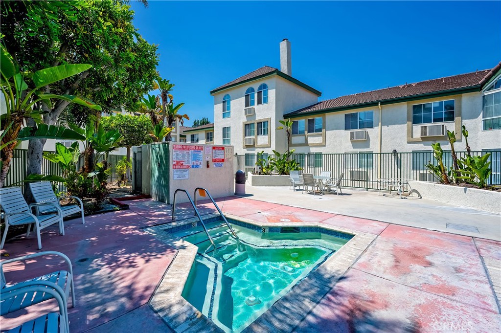15000 Downey Avenue, Unit 343 Paramount, CA 90723 - Photo 36 of 39 a view of a house with backyard porch and sitting area