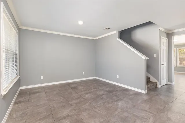 an empty room with a natural light