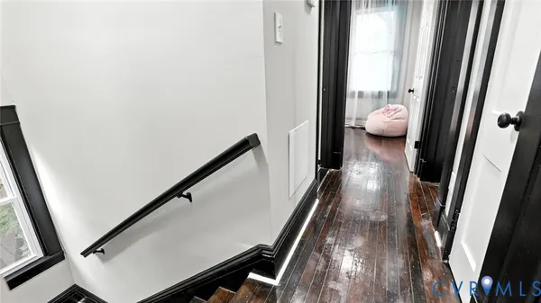 a bathroom with a sink and a large mirror