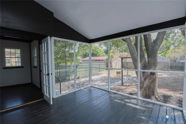 a view of a backyard with trees