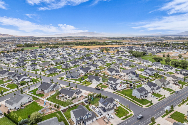 2454 West Jackson Street Mapleton, UT 84664 - Photo 60 of 63 Aerial view of residential area featuring mountains