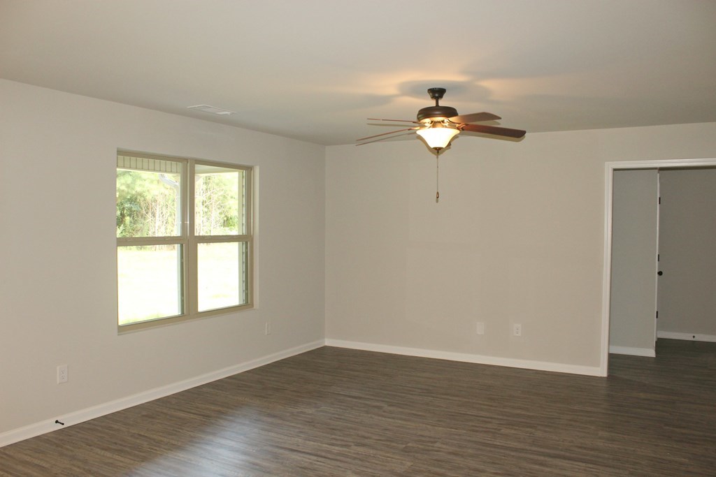 965 Weldon Road Forsyth, GA 31029 - Photo 3 of 11 a a light on the desk with a window
