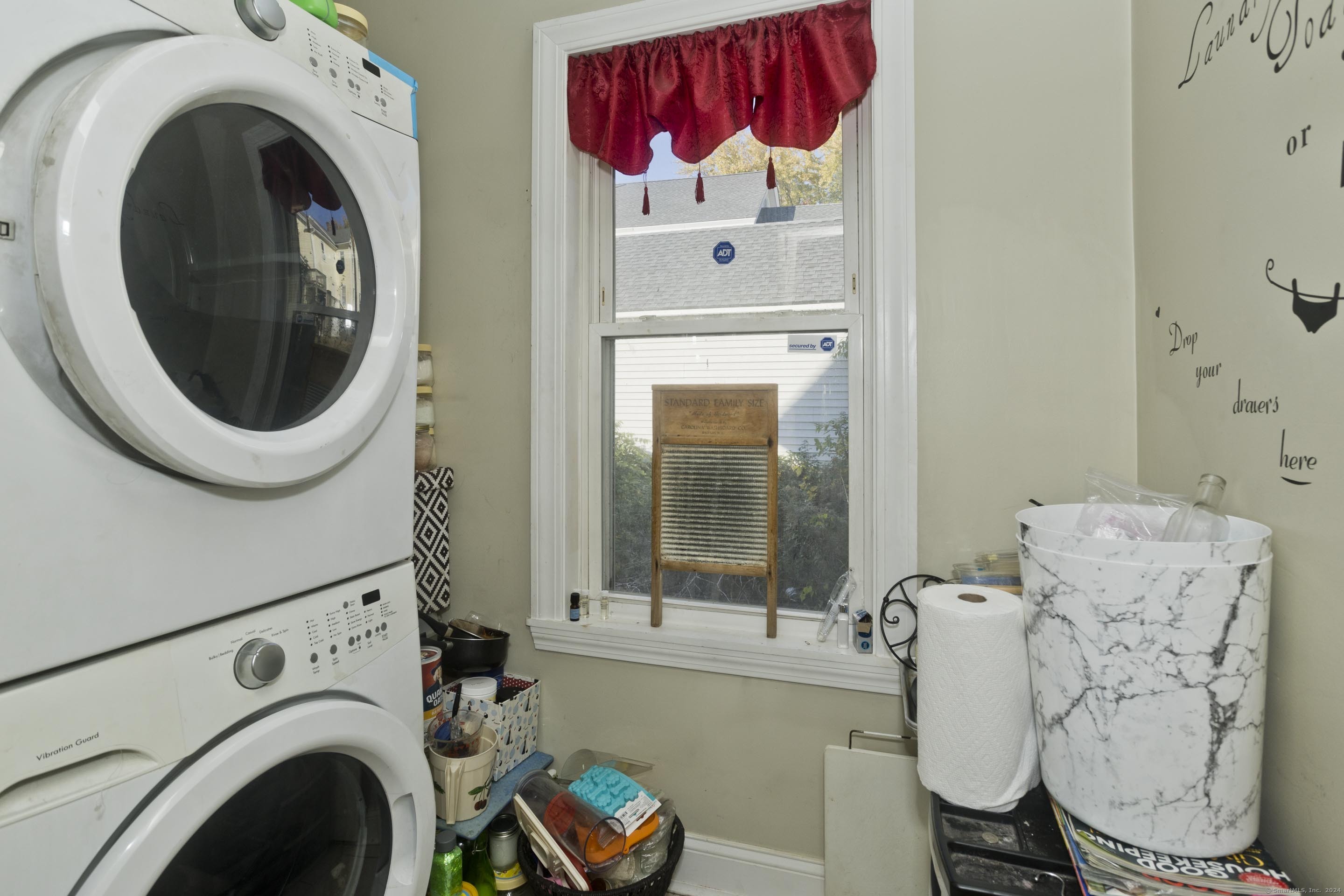 69 Prospect Street Enfield, CT 06082 - Photo 12 of 14 a utility room with dryer and washer
