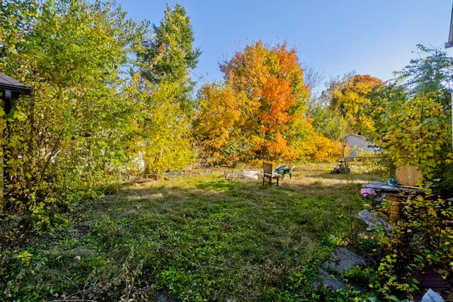 a kitchen with sink cabinets and appliances