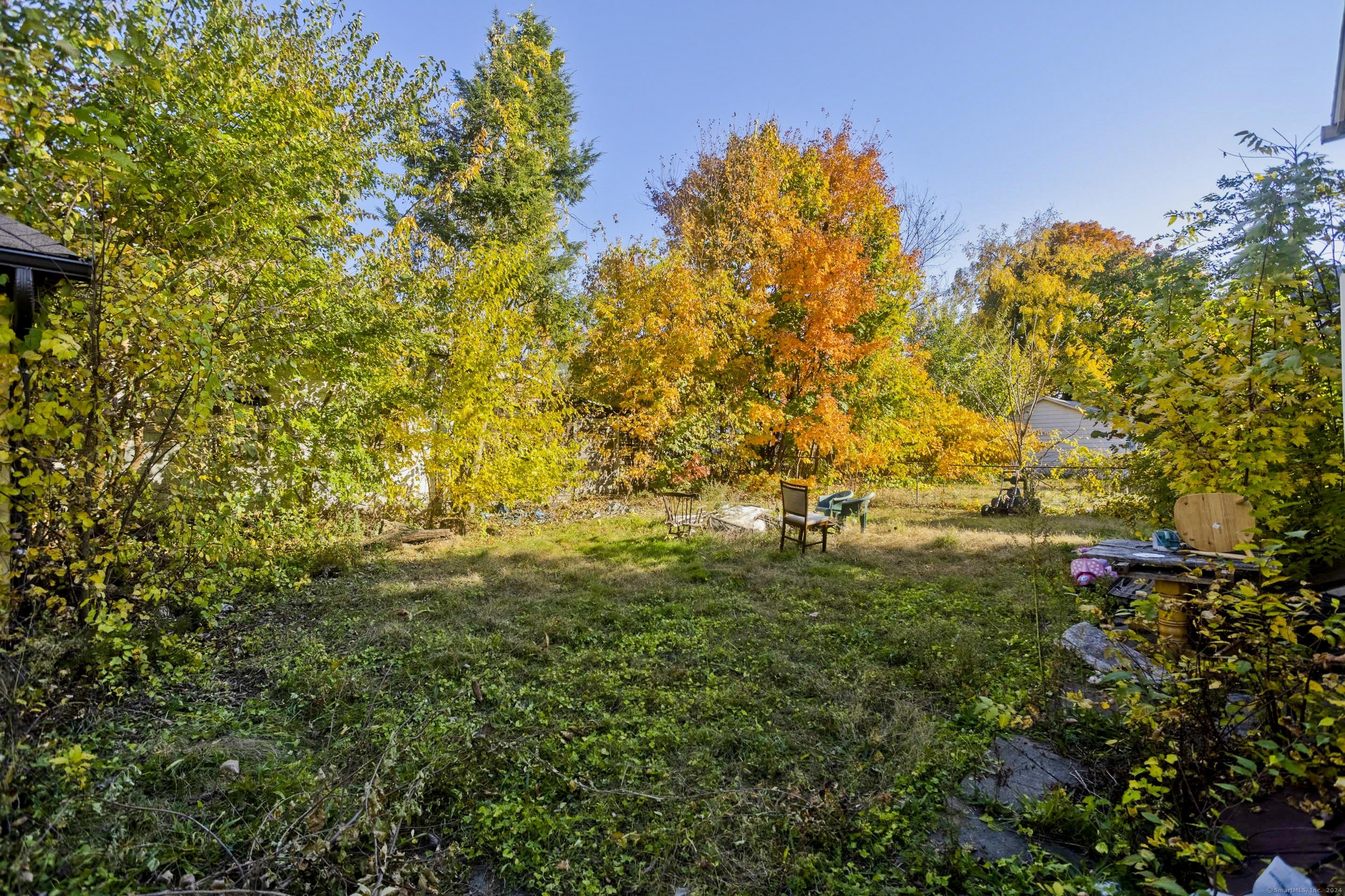 69 Prospect Street Enfield, CT 06082 - Photo 4 of 14 a view of a yard
