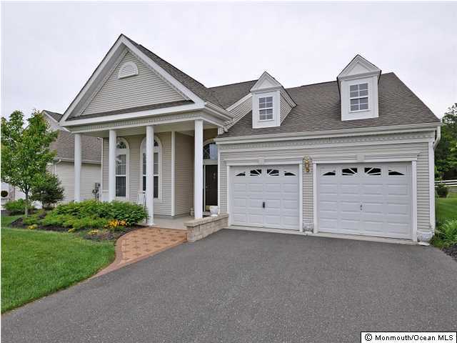 8 Nottingham Way Jackson, NJ 08527 - Photo 1 of 24 front view of a house with a yard